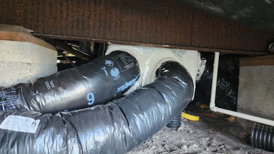 Close-up of an insulated HVAC ductwork hose showing secure connections for efficient airflow
